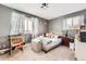Bedroom with a queen bed and built in desk at 12626 N 1St St, Parker, CO 80134