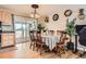 Dining area with wood table and access to a patio at 12626 N 1St St, Parker, CO 80134