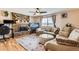 Living room with stone fireplace and comfy couch at 12626 N 1St St, Parker, CO 80134