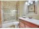 Bathroom features include a tiled shower with glass doors, classic vanity, and neutral walls at 11881 County Road 37, Fort Lupton, CO 80621