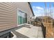 Backyard featuring a concrete patio with railing and steps down to the yard at 12547 Lake View St, Longmont, CO 80504
