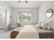 Bright, serene main bedroom featuring neutral tones, ample natural light, and comfortable furnishings at 12547 Lake View St, Longmont, CO 80504