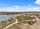 A park situated next to a body of water with walking trails and picnic areas for community residents at 12547 Lake View St, Longmont, CO 80504