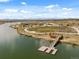 A beautiful park on a lake with a wooden deck and scenic walking trails, perfect for relaxation at 12547 Lake View St, Longmont, CO 80504