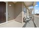Inviting front porch with seating, offering a cozy outdoor space to relax and enjoy the neighborhood views at 12547 Lake View St, Longmont, CO 80504