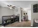 Comfortable bedroom with a loft bed, ceiling fan, and convenient ensuite bathroom access at 3253 S Estes St, Lakewood, CO 80227