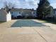 Large backyard pool is covered with a safety tarp at 3253 S Estes St, Lakewood, CO 80227