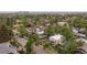 Residential neighborhood with mature trees, showcasing a home with a well-manicured lawn at 4528 W 34Th Ave, Denver, CO 80212