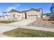 Attractive two-story house with a three-car garage and nicely landscaped yard at 3816 N Elk St, Aurora, CO 80019