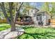 Backyard of home features grass, hardscape, gazebo and patio at 1462 Marigold Dr, Lafayette, CO 80026