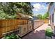 Great backyard featuring a bar, hot tub, privacy fence and professional landscaping at 1462 Marigold Dr, Lafayette, CO 80026