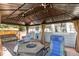 Cozy backyard patio with gazebo, fire pit, and comfortable seating at 1462 Marigold Dr, Lafayette, CO 80026
