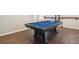 Finished basement game room with pool table and wood flooring at 1462 Marigold Dr, Lafayette, CO 80026
