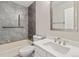 Bathroom with a tiled shower and grab bars at 1462 Marigold Dr, Lafayette, CO 80026