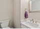 Powder room with a modern vanity and fixtures at 1462 Marigold Dr, Lafayette, CO 80026
