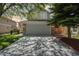 Charming home exterior with a wide driveway, stone accents, and a well-maintained lawn at 1462 Marigold Dr, Lafayette, CO 80026