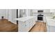 Well-equipped kitchen with an island, stainless steel appliances, and ample storage at 1462 Marigold Dr, Lafayette, CO 80026