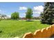 Community park featuring mature trees, a playground and expansive green space at 1462 Marigold Dr, Lafayette, CO 80026
