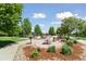 Community park featuring a playground, picnic tables, mature trees and a grill at 1462 Marigold Dr, Lafayette, CO 80026