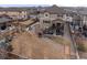 Aerial view of the backyard featuring a deck, patio, hot tub, and play area at 17077 E 111Th Ave, Commerce City, CO 80022