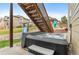 Hot tub with stairs and cover featured in the backyard at 17077 E 111Th Ave, Commerce City, CO 80022