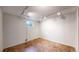 Basement room featuring modern track lighting and a window at 20091 E Bellewood Dr, Centennial, CO 80015