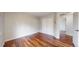 Simple bedroom showcasing hardwood floors and soft, natural lighting at 20091 E Bellewood Dr, Centennial, CO 80015