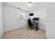 Bright office space with a dedicated work area and natural light streaming through the window at 8022 S Jay Dr, Littleton, CO 80128