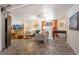 Spacious basement with a relaxing seating area and a foosball table for entertainment at 202 Lower Glenway St, Palmer Lake, CO 80133
