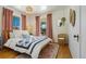 Inviting bedroom filled with natural light, providing a serene and restful atmosphere at 202 Lower Glenway St, Palmer Lake, CO 80133