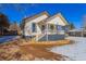 Charming two-story house featuring a welcoming front porch, and beautiful architectural details at 202 Lower Glenway St, Palmer Lake, CO 80133