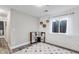 Playroom with gray walls, a toy kitchen, and a colorful rug at 11203 Dexter St, Thornton, CO 80233