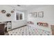 Playroom featuring white walls, built-in shelving, and a playful rug at 11203 Dexter St, Thornton, CO 80233