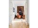 Home office accessible through french doors and featuring a leather armchair at 1221 W 144Th Ct, Westminster, CO 80023