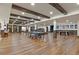 Basement featuring a game room with ping pong, pool table, and leather seating area at 7390 Sagebrush Dr, Parker, CO 80138