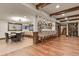 Spacious finished basement with a bar, dining area, and wine storage is great for entertaining guests at 7390 Sagebrush Dr, Parker, CO 80138