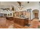 Spacious kitchen with custom cabinetry, granite countertops and stainless steel appliances at 7390 Sagebrush Dr, Parker, CO 80138