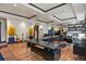 Large office space with a long desk, ample storage, and recessed lighting in the ceiling at 7390 Sagebrush Dr, Parker, CO 80138