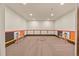 Spacious recreation room with hockey nets and a neutral carpet with room to play and have fun at 7390 Sagebrush Dr, Parker, CO 80138