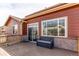 Enjoy this spacious back deck with a charming bench and convenient access to the home at 5540 Palomino Way, Frederick, CO 80504