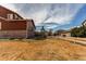 Spacious backyard with white fence offering both privacy and a charming aesthetic at 5540 Palomino Way, Frederick, CO 80504