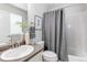 Neutral bathroom with decorative mirror and shower tub combo at 5540 Palomino Way, Frederick, CO 80504