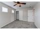 Neutral bedroom with carpet, fan and closet at 5540 Palomino Way, Frederick, CO 80504