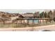 Community pool with cabana in a well-maintained neighborhood at 5540 Palomino Way, Frederick, CO 80504