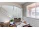 Elegant foyer with white trim, hardwood floors, and natural light creating a bright and airy entrance at 5540 Palomino Way, Frederick, CO 80504