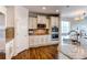 Well-equipped kitchen with granite countertops, modern appliances, and stylish cabinetry at 5540 Palomino Way, Frederick, CO 80504