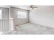 Upstairs loft featuring neutral paint and a ceiling fan at 5540 Palomino Way, Frederick, CO 80504