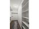 Walk-in closet that features shelving and ample storage space at 7710 W 87Th Dr # K, Arvada, CO 80005