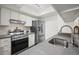 Modern kitchen showcasing stainless steel appliances and sleek countertops at 7710 W 87Th Dr # K, Arvada, CO 80005