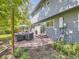 Outdoor patio with patio furniture and a well-maintained yard at 4196 S Reading Way, Denver, CO 80237